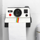 Illustration for article titled Polaroid Toilet Paper Holder Captures Memories You Dont Want To Keep